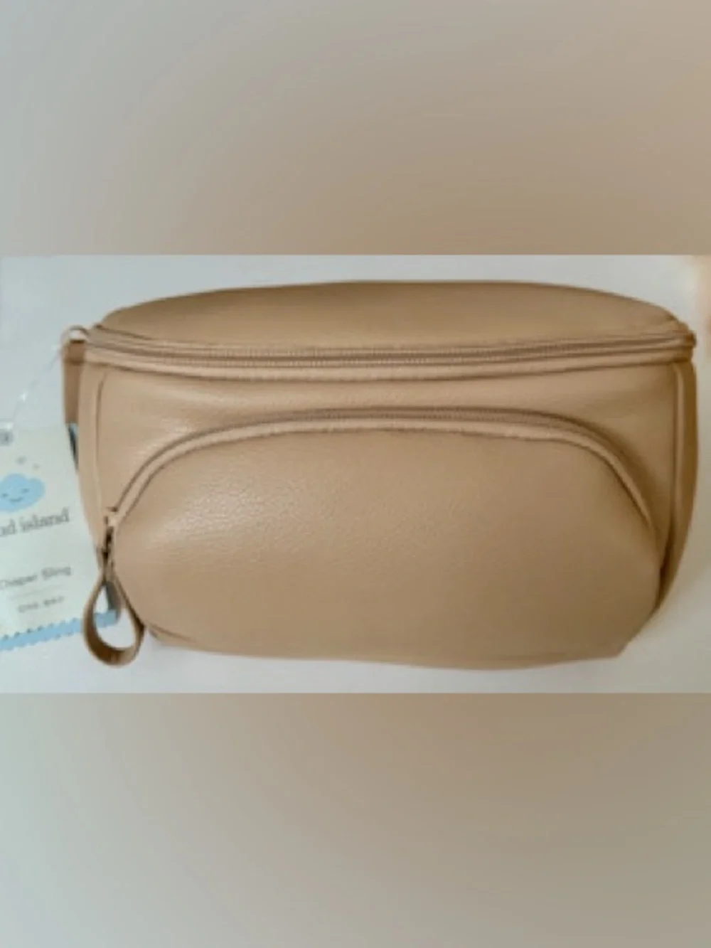 Cloud Island diaper sling in tan with checkered strap